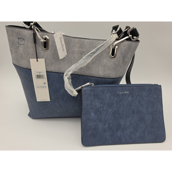 Calvin Klein Handbags - New Leather Calvin Klein purse Blue Gray Tote Purchased From Neiman Marcus.